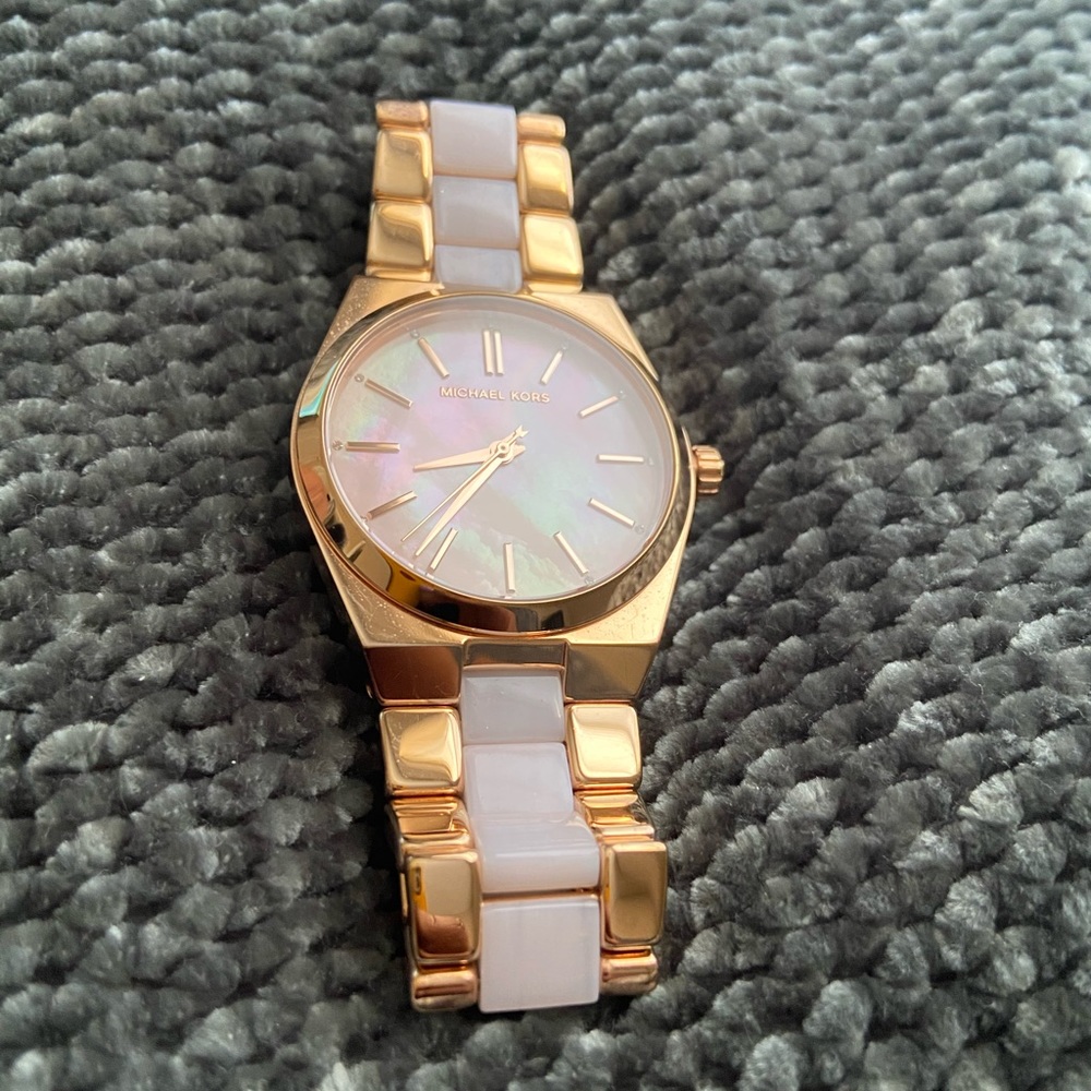 MK rose gold and pink marble watch